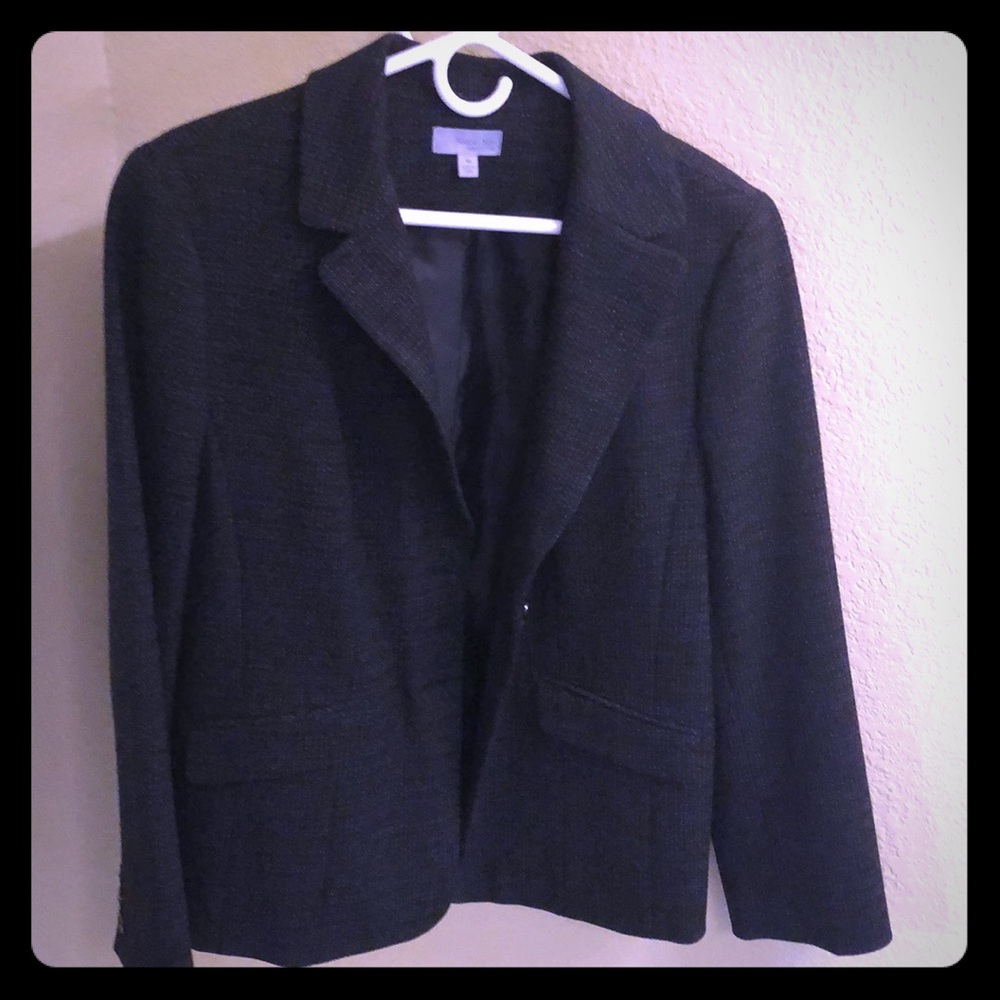 Black blazer, small white dots and lining inside.